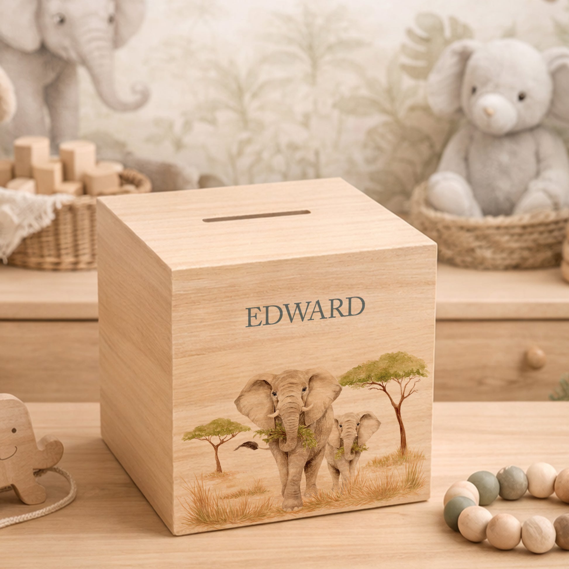 handmade personalised nursery money box with soft watercolour artwork, mummy and baby elephant strolling through the Savanah