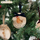 Add an elegant touch to your festive décor with our handcrafted oval-shaped marble baubles. Featuring beautiful watercolour designs of countryside animals and finished with a velvet ribbon in your choice of colour, these baubles can be personalised to reflect your unique style.