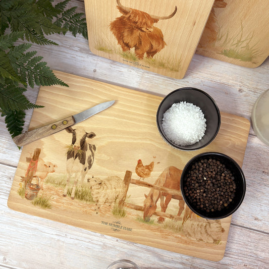 Watercolour chopping board with All of the animals from around the farm. 
