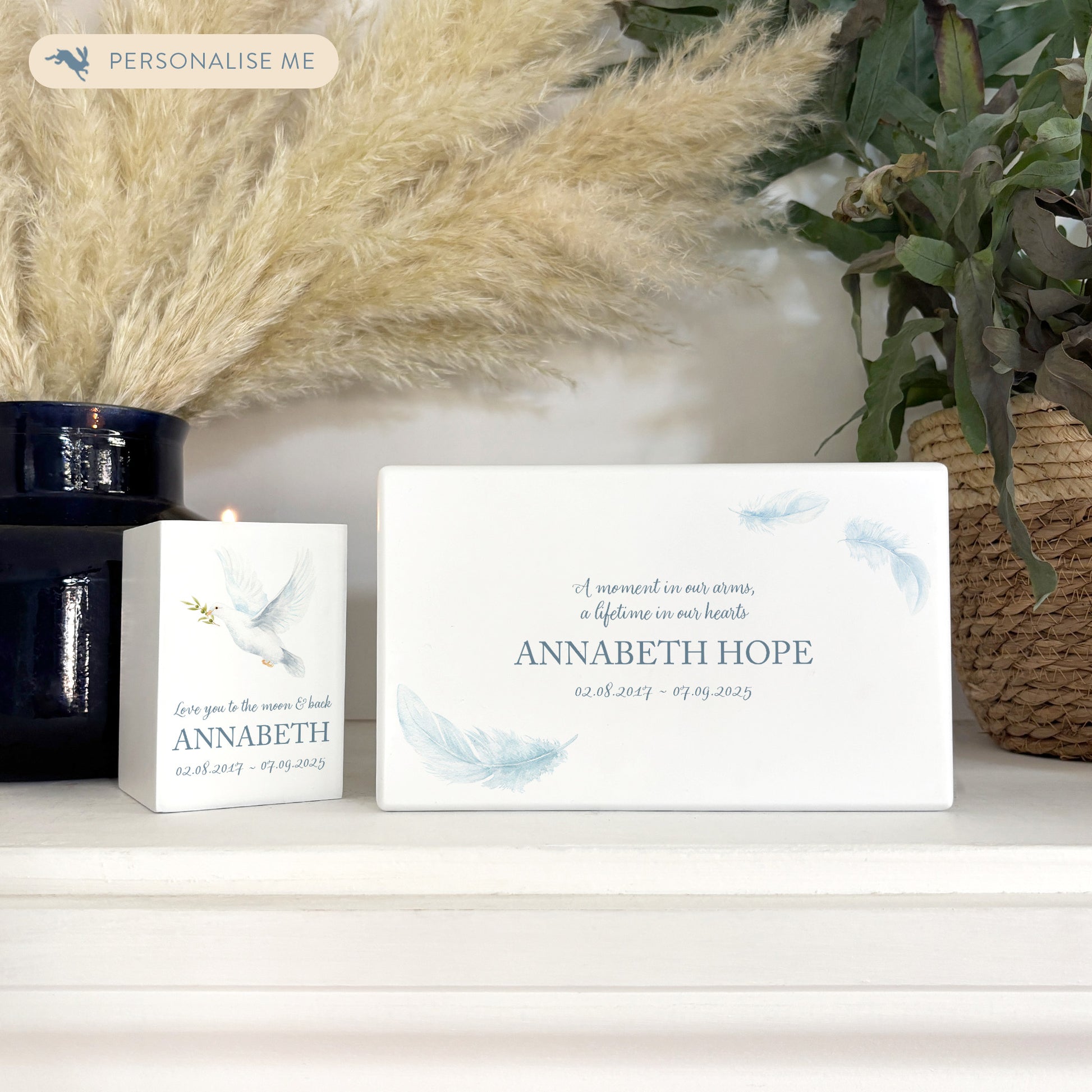 Luxury solid wooden white painted Urn with Floating Feathers, a watercolour illustration, our urns and Caskets for displaying or burying ashes. Customisable and can be personalised. Perfect funeral memory keepsake urn, for storing ashes for humans and pets. 