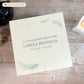 White Square personalised Wooden box with a decorative lid featuring illustrations of floating Feathers, Perfect funeral memory keepsake box, for storing ashes, order of service, flowers and capturing your loved ones things in one place. 