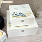 White Square personalised Wooden box with a decorative lid featuring illustrations of a pair of football boots in blue, a goal and football. Perfect funeral memory keepsake box, for storing ashes, order of service, flowers and capturing your loved ones things in one place. 