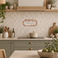 Personalised wreath style wall tile, with a family name in the centre. Stylish and modern look. 