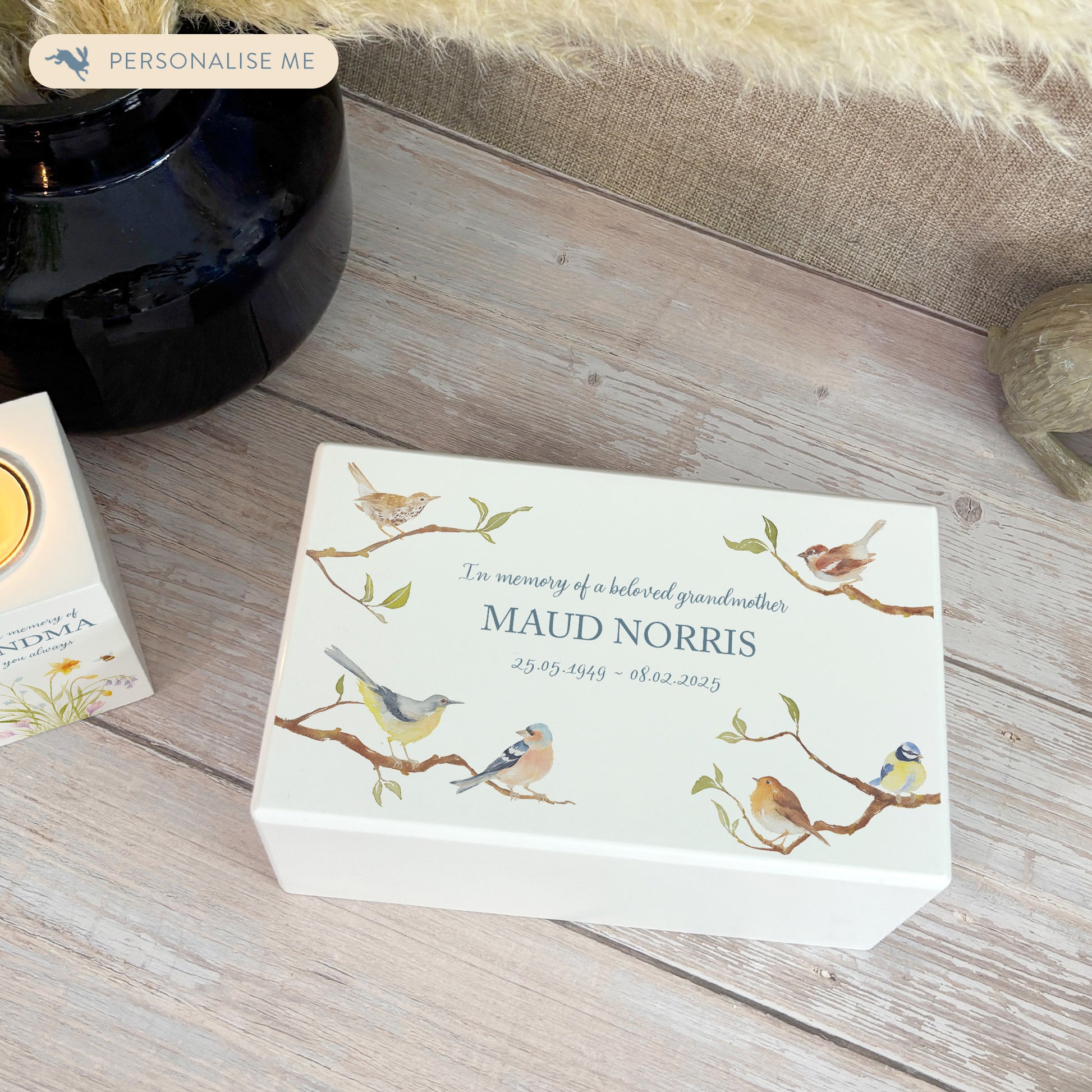 Luxury solid wooden white painted Urn ,  with Garden Birds on Branches. A watercolour illustration, our urns and Caskets for displaying or burying ashes. Customisable and can be personalised. Perfect funeral memory keepsake urn, for storing ashes for humans and pets. 