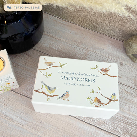 Luxury solid wooden white painted Urn ,  with Garden Birds on Branches. A watercolour illustration, our urns and Caskets for displaying or burying ashes. Customisable and can be personalised. Perfect funeral memory keepsake urn, for storing ashes for humans and pets. 