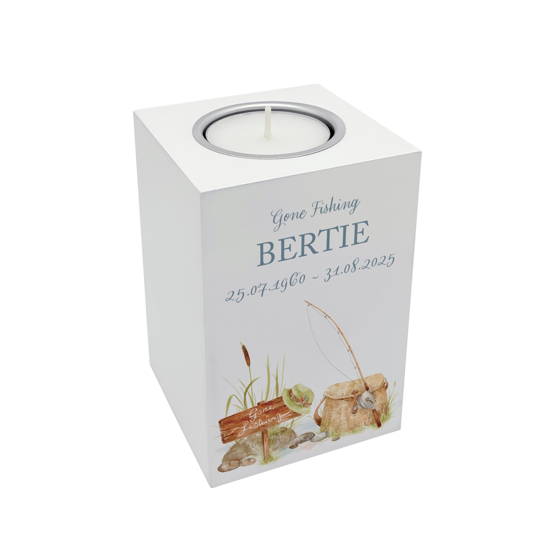 wooden cuboid luxury tealight holder with gorgeous personalised options . Each product is lovingly designed, handmade with our Countryside inspired watercolour designs. This design features a fishing scene with a rod and fishing bag, perfect for Brother, Dad, Son or Grandad. unique designs to remember a loved on, great for memorial occasions 