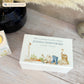 A beautifully crafted solid wooden urn, finished in white with a soft watercolour design for the avid Gardener "Gone Gardening" Thoughtfully made for either display or burial, this personalised urn can be customised to create a meaningful memorial. Perfect for holding ashes of a loved one or a beloved pet, it serves as a comforting tribute and keepsake.