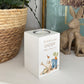 wooden cuboid luxury tealight holder with gorgeous personalised options . Each product is lovingly designed, handmade with our Countryside inspired watercolour designs. This design features blue wellies, carrots, a robin sitting on a brown watering can and some gardening gloves. unique designs for a truly one off special occasion for a loved one- The perfect memorial gift. 