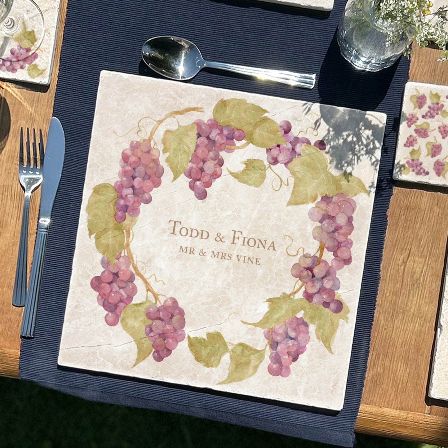 A personalised marble large platter with a grape vine wreath watercolour design. Create a personalised placemat, serving platter, trivet or cheeseboard as a luxury gift.