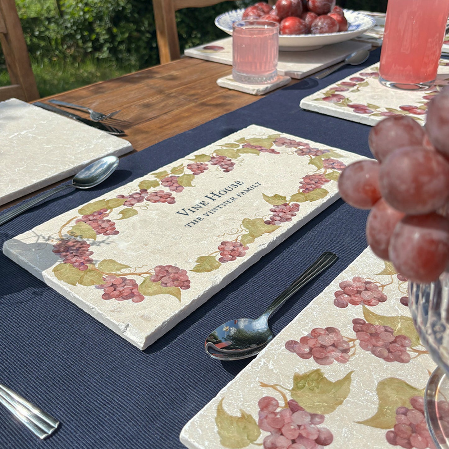 A personalised marble sharing platter with a grape vine watercolour design. Create a personalised serving platter, trivet or cheeseboard as a luxury gift.