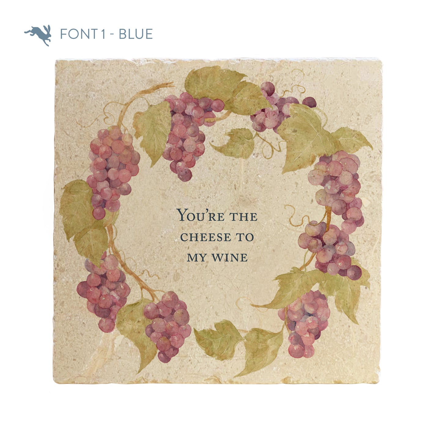 A large marble platter featuring a wreath of grape vines and leaves, personalised with a bespoke phrase in the centre of the platter in a blue font.