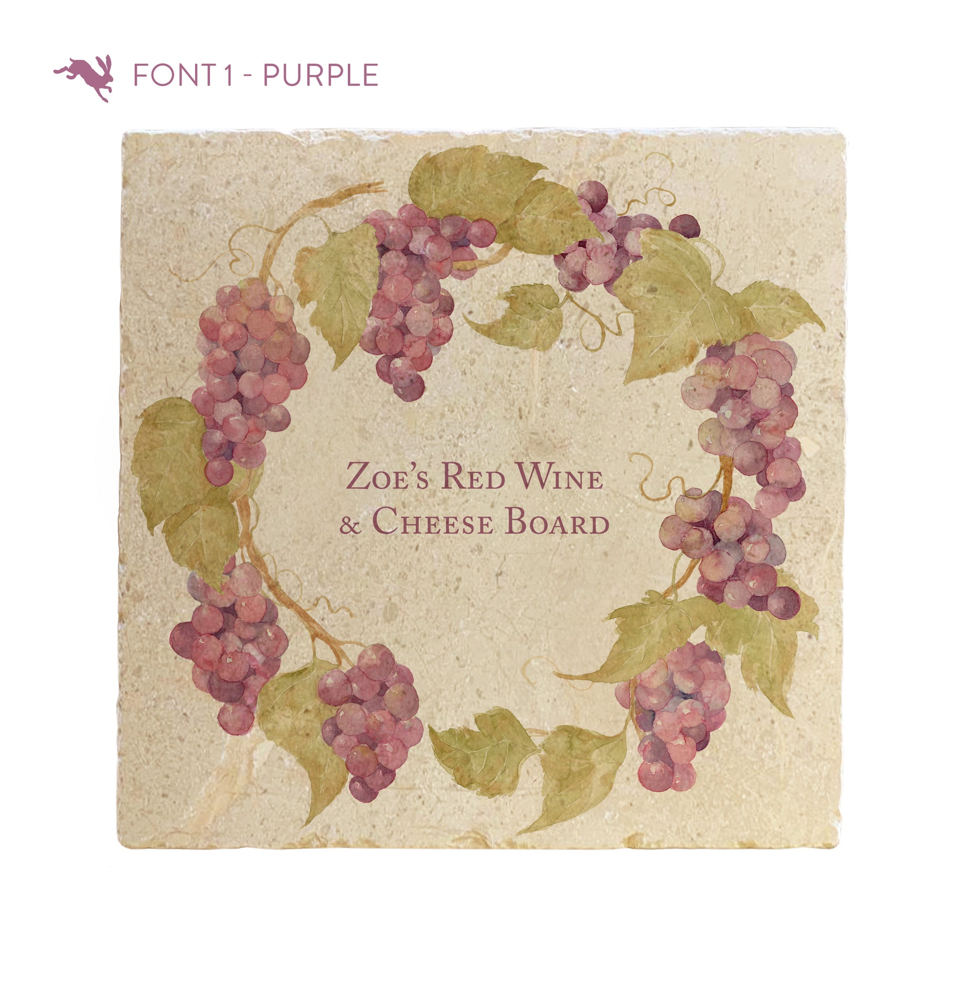 A large marble platter featuring a wreath of grape vines and leaves, personalised with a bespoke message in the centre of the platter in a purple font.