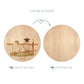 Wooden cutting board with a sheep illustration on one side and plain wood on the other, with text indicating which side to display and which to chop.