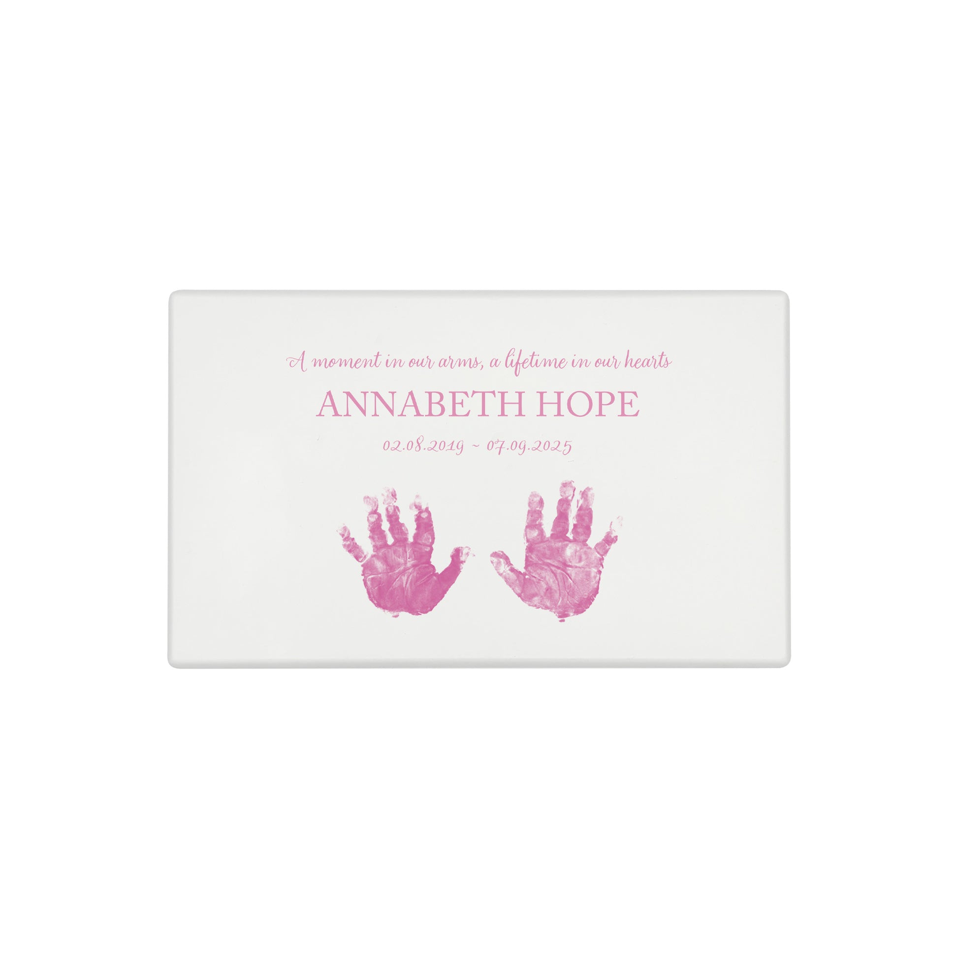 A beautifully crafted solid wooden urn, finished in white with a soft watercolour design of baby's handprints and footprints, Thoughtfully made for either display or burial, this personalised urn can be customised to create a meaningful memorial. Perfect for holding ashes of a loved one or a beloved pet, it serves as a comforting tribute and keepsake. Helping with baby loss