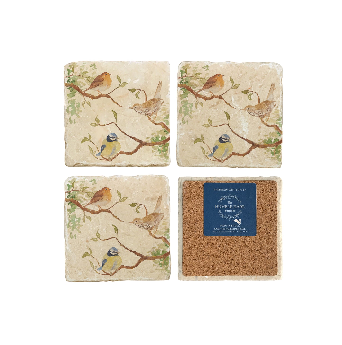 A set of four square marble coasters, featuring a watercolour design of British garden birds in the hedgerow around the paddock gate. One coaster is flipped to show that the coasters are backed with cork.