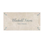 Marble tile in a cream colour with personalised text. 