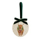 An oval marble Christmas ornament featuring a Highland cow wearing a green wreath, with personalised text reading 'Merry Christmas 2026' written below. The ornament has a dark green velvet ribbon and bow hanging loop at the top, set against a plain white background.