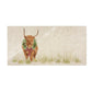 A rectangular marble sharing platter featuring a watercolour highland cow with a Christmas wreath and tartan bow around his neck.