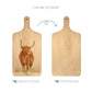 Handmade paddle board in Beech wood, featuring a painted Highland cow with a hand tied luxury blue ribbon. 