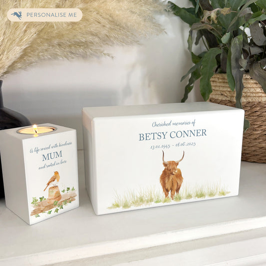 Luxury solid wooden white painted Urn featuring a Highland Cow. A watercolour illustration, our urns and Caskets for displaying or burying ashes. Customisable and can be personalised. Perfect funeral memory keepsake urn, for storing ashes for humans and pets. 