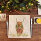 A large square marble placemat with a watercolour highland cow wearing a Christmas wreath around his neck.