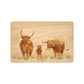 Handmade rectangular chopping board featuring a watercolour Highland Cow illustration, finished with blue ribbon.