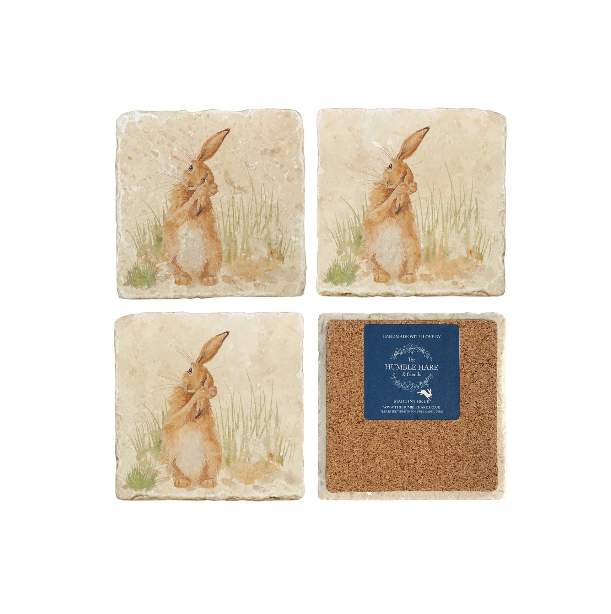 A set of 4 square marble coasters, featuring a watercolour design of a hare washing his ear in the English countryside. One coaster is flipped to show that the coasters are backed with cork.