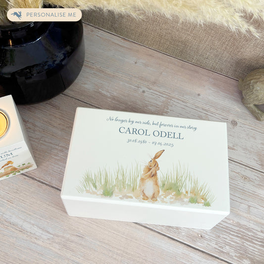 Luxury solid wooden white painted Urn featuring a Hare. A watercolour illustration, our urns and Caskets for displaying or burying ashes. Customisable and can be personalised. Perfect funeral memory keepsake urn, for storing ashes for humans and pets. 