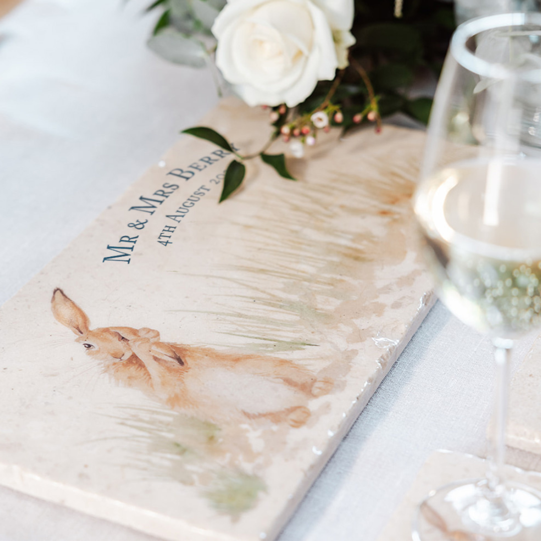 A personalised marble sharing platter with a hare watercolour design. Create a personalised serving platter, trivet or cheeseboard as a luxury gift.