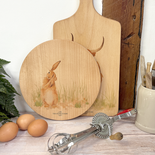 Rustic Beechwood chopping board with countryside-style Hare painting and luxury blue ribbon.