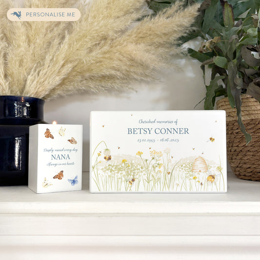 Luxury solid wooden white painted Urn featuring a Bee flower meadow and buzzy bees. A watercolour illustration, our urns and Caskets for displaying or burying ashes. Customisable and can be personalised. Perfect funeral memory keepsake urn, for storing ashes for humans and pets. 