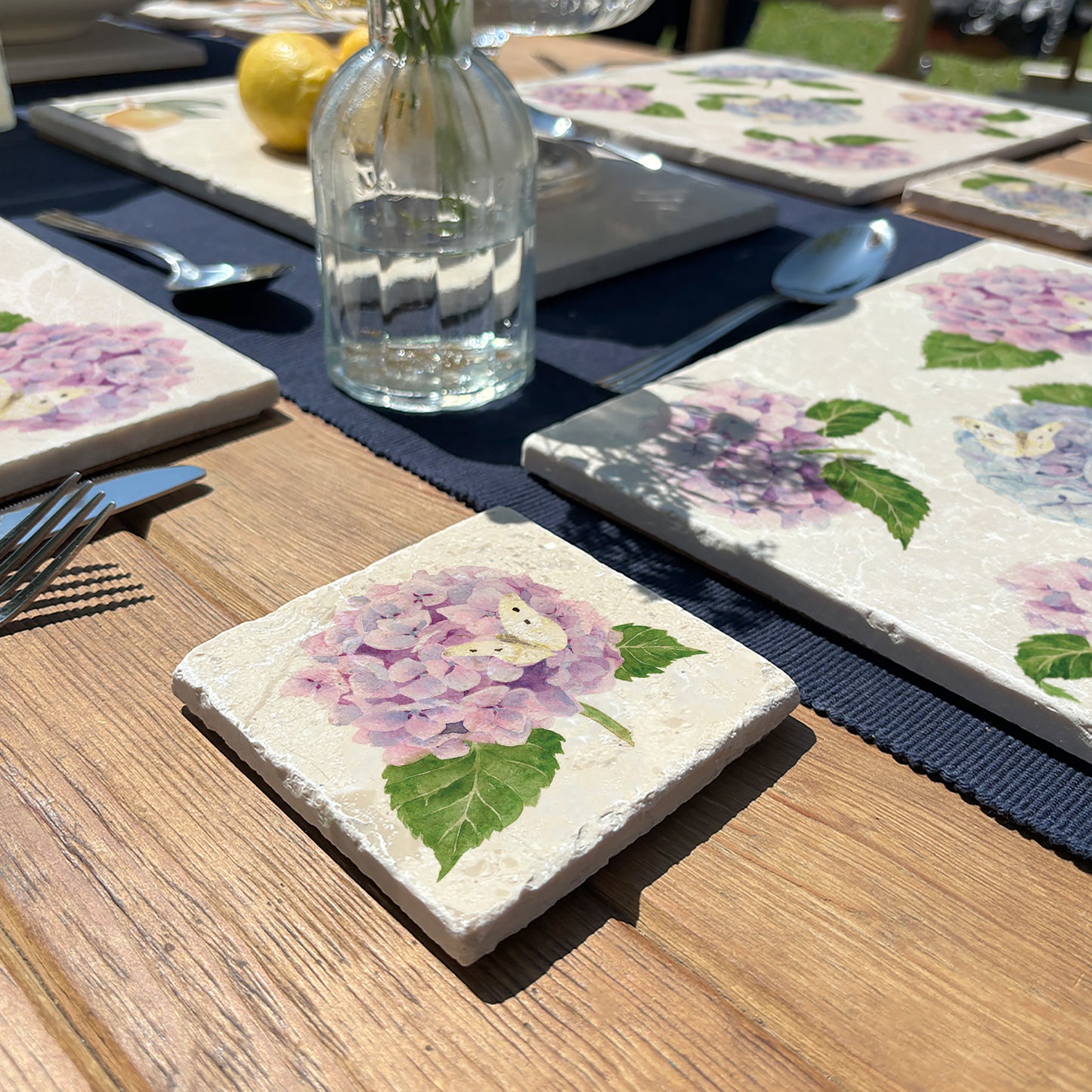 Stunning watercolour marble set of 4 coasters featuring The Humble Hares classic style Pinks, blue and purples with some beautiful Butterflies landing on the stunning flowers. 