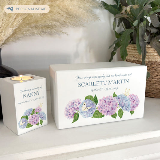 Luxury solid wooden white painted Urn with  Hydrangeas and butterflies, a watercolour illustration, our urns and Caskets for displaying or burying ashes. Customisable and can be personalised. Perfect funeral memory keepsake urn, for storing ashes for humans and pets. 