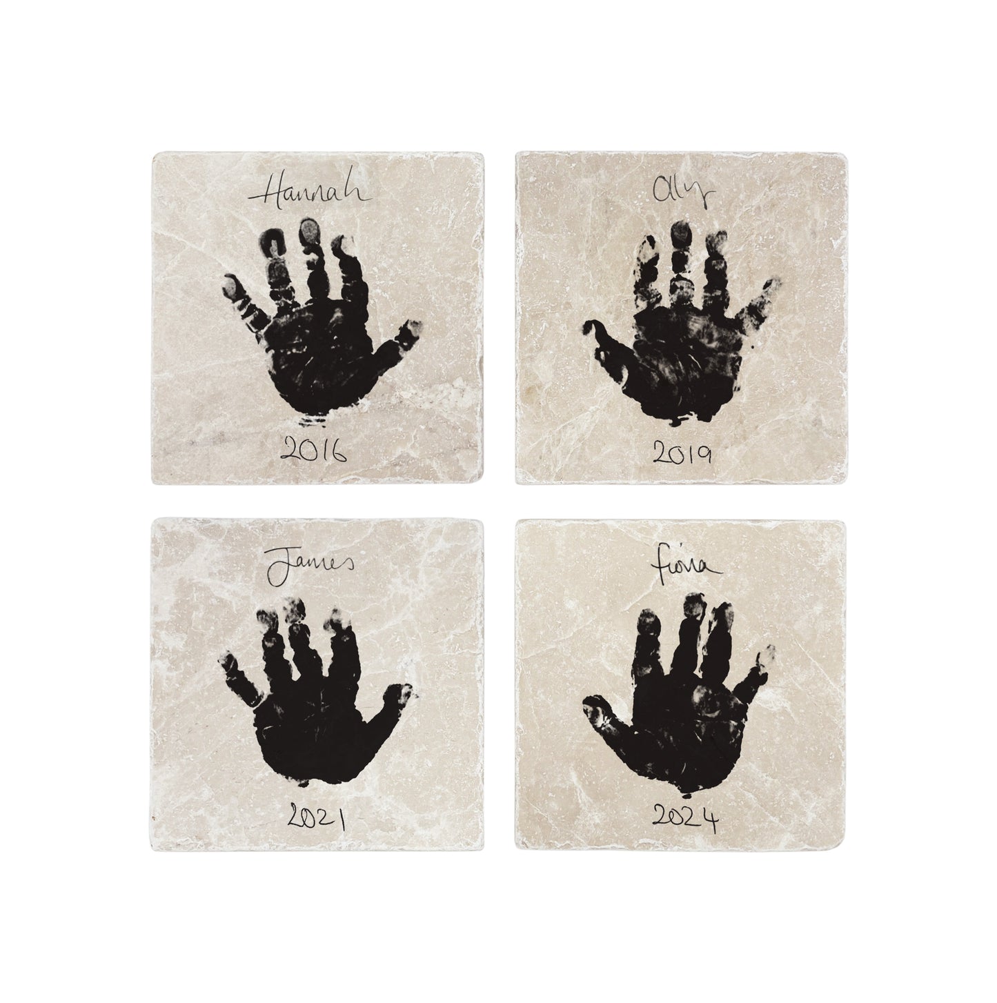 A personalised set of 4 marble coasters displaying baby’s tiny handprints and handwritten names, perfect for grandparents, celebrating cherished moments with the family.