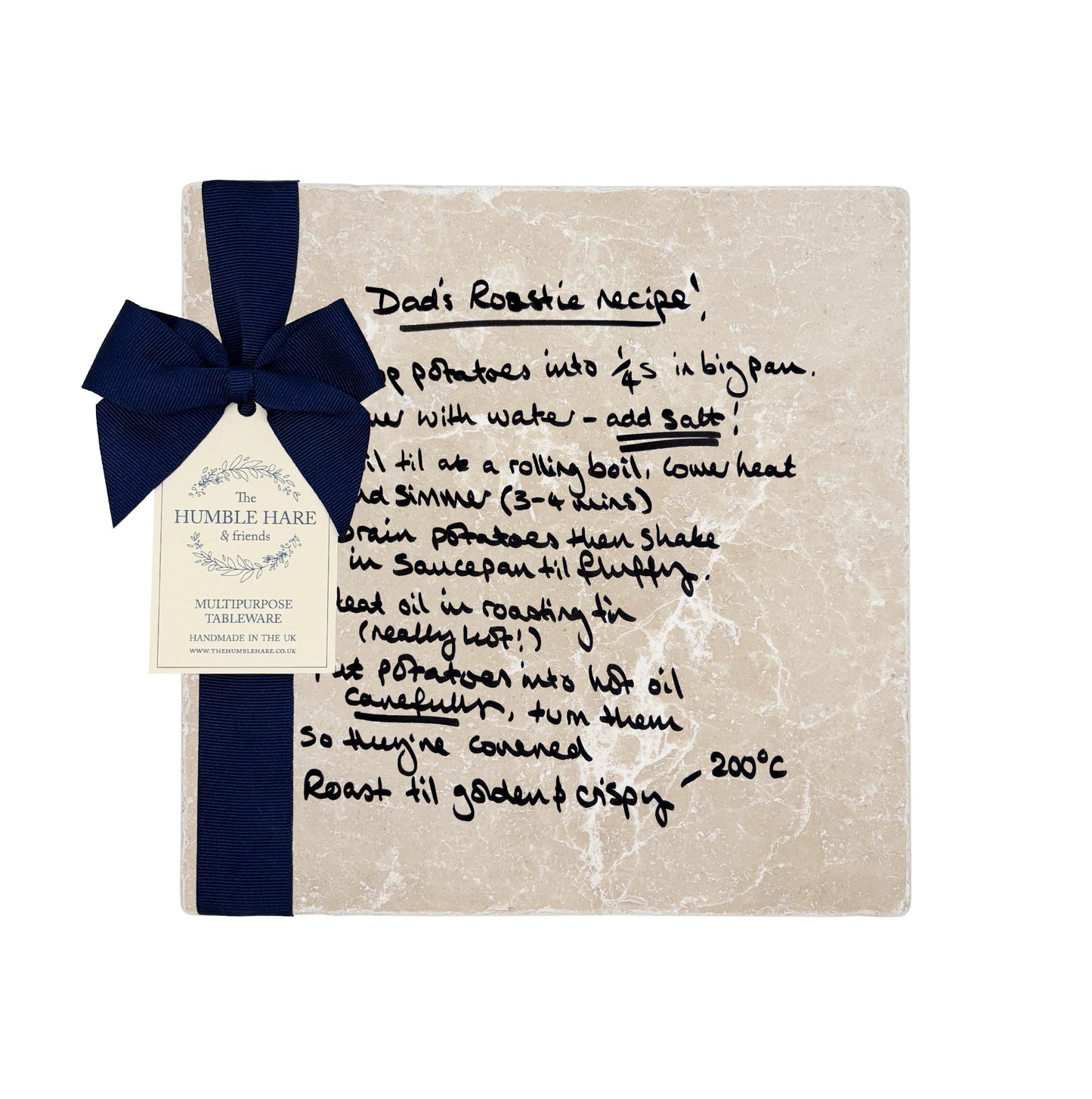 A custom medium marble platter featuring your family's secret recipe – a heartfelt gift for loved ones. Packaged with a luxurious blue bow and gift tag.