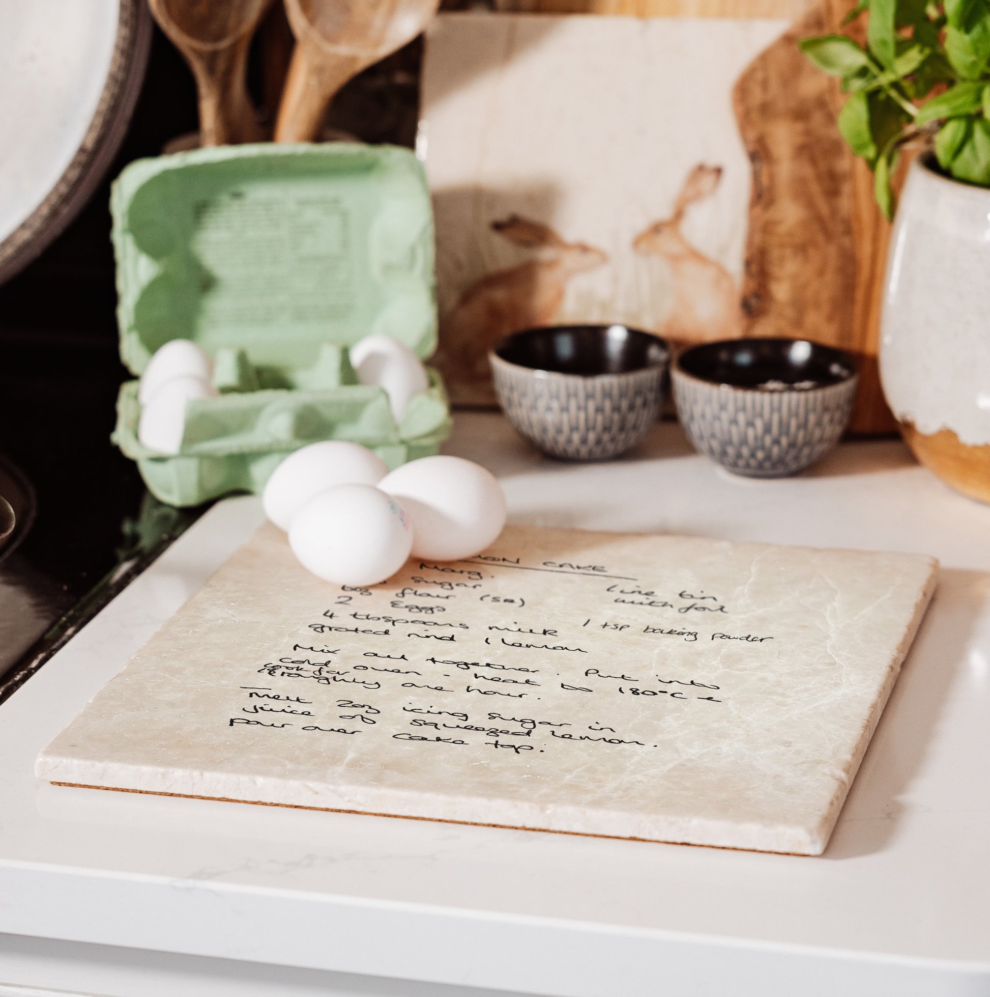 A custom marble worktop saver and trivet personalised with a secret family recipe – unique gift for friends and family.