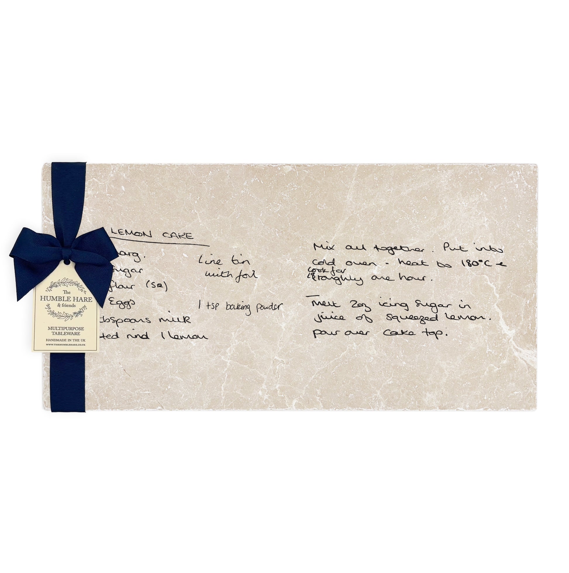 Beautiful marble platter personalized with a secret recipe – keepsake gift for food lovers. Packaged with a luxurious blue bow and tag.