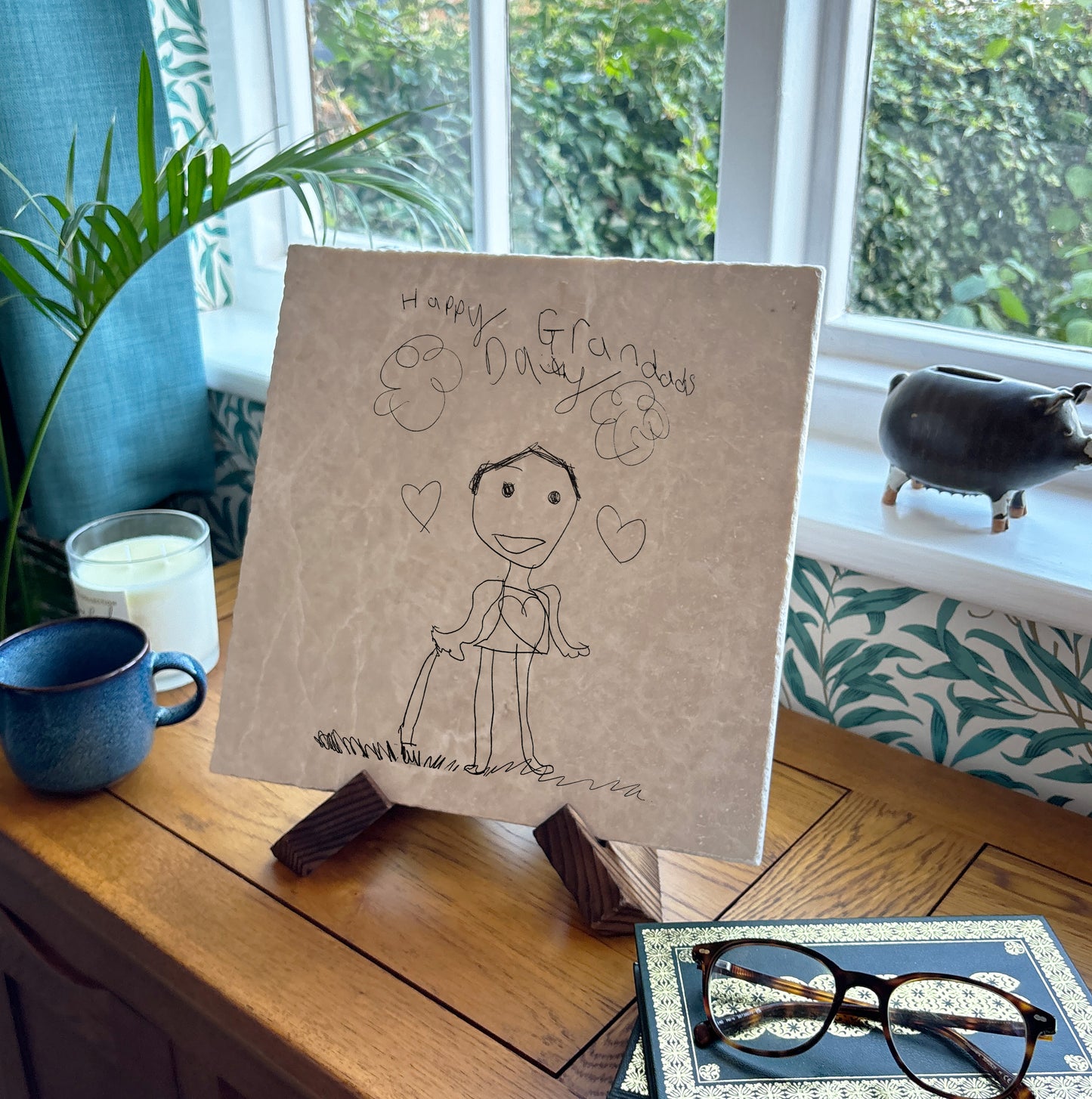 Customise a marble tile with a child’s hand-drawn masterpiece, perfect as a keepsake for family and loved ones.