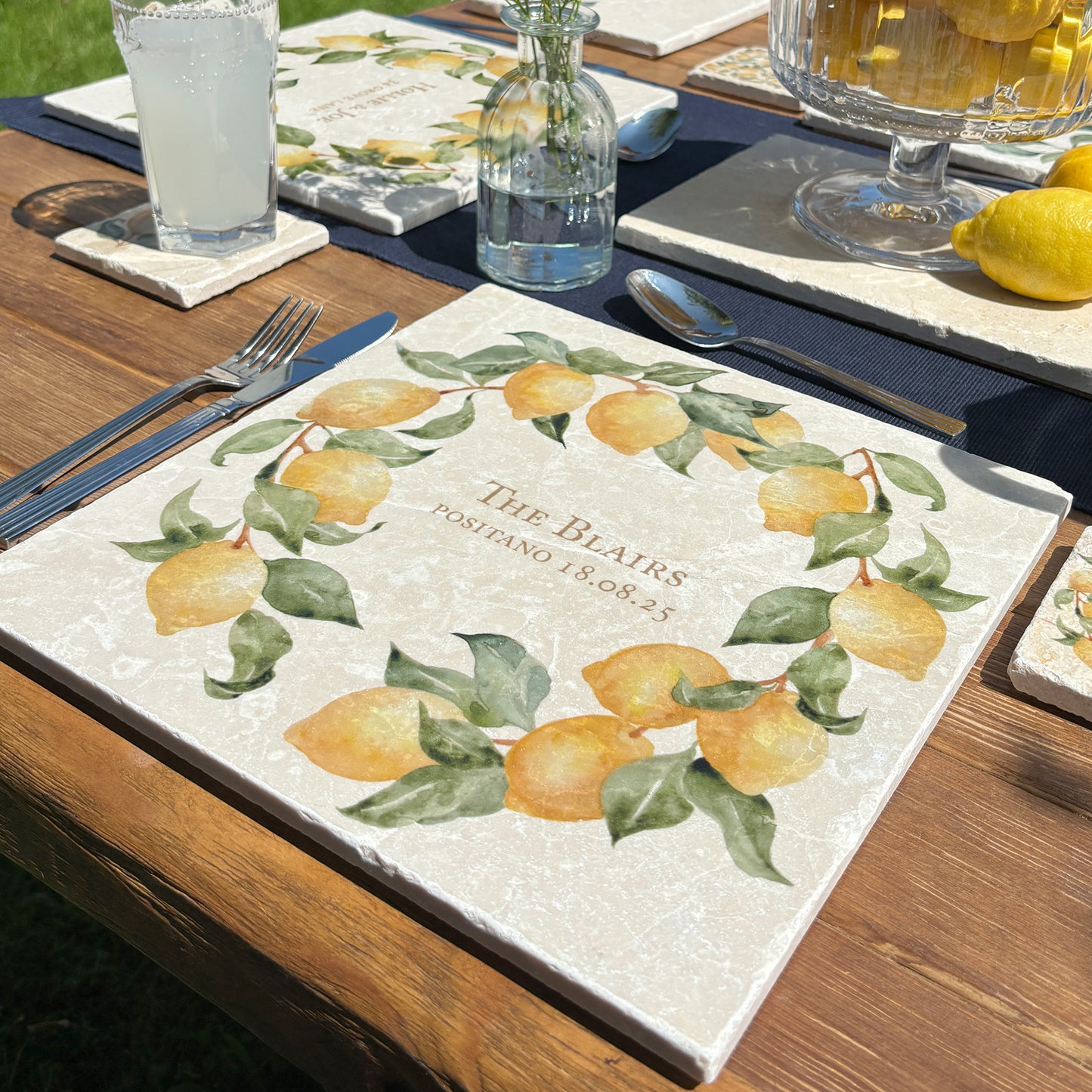 A personalised marble large platter with a lemon wreath watercolour design. Create a personalised placemat, serving platter, trivet or cheeseboard as a luxury gift.