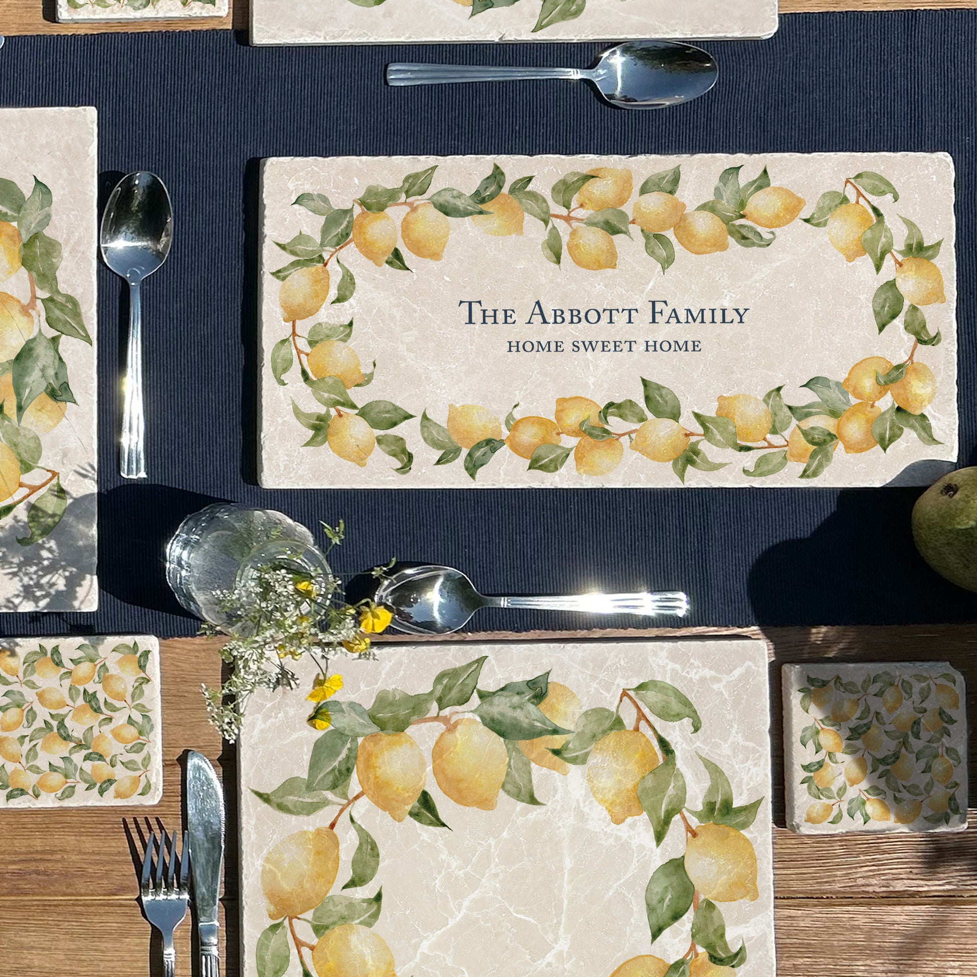 A personalised marble sharing platter with a lemon wreath watercolour design. Create a personalised serving platter, trivet or cheeseboard as a luxury gift.