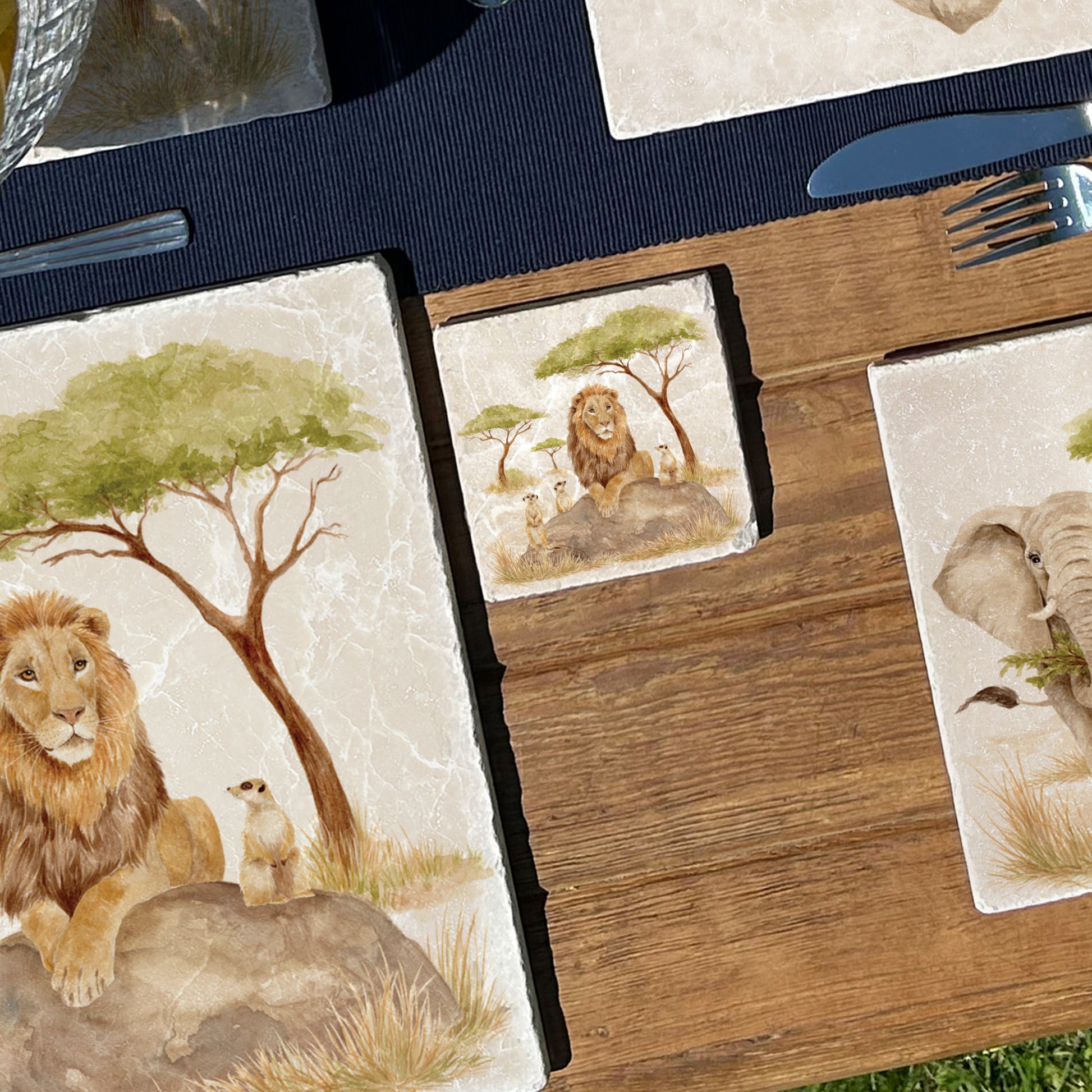 The Savannah Collectors set is perfect for the safari lover, featuring beautiful watercolour designs on our much loved marble platters and coasters. You can find a Lion and Meerkats on this set of 4 coasters