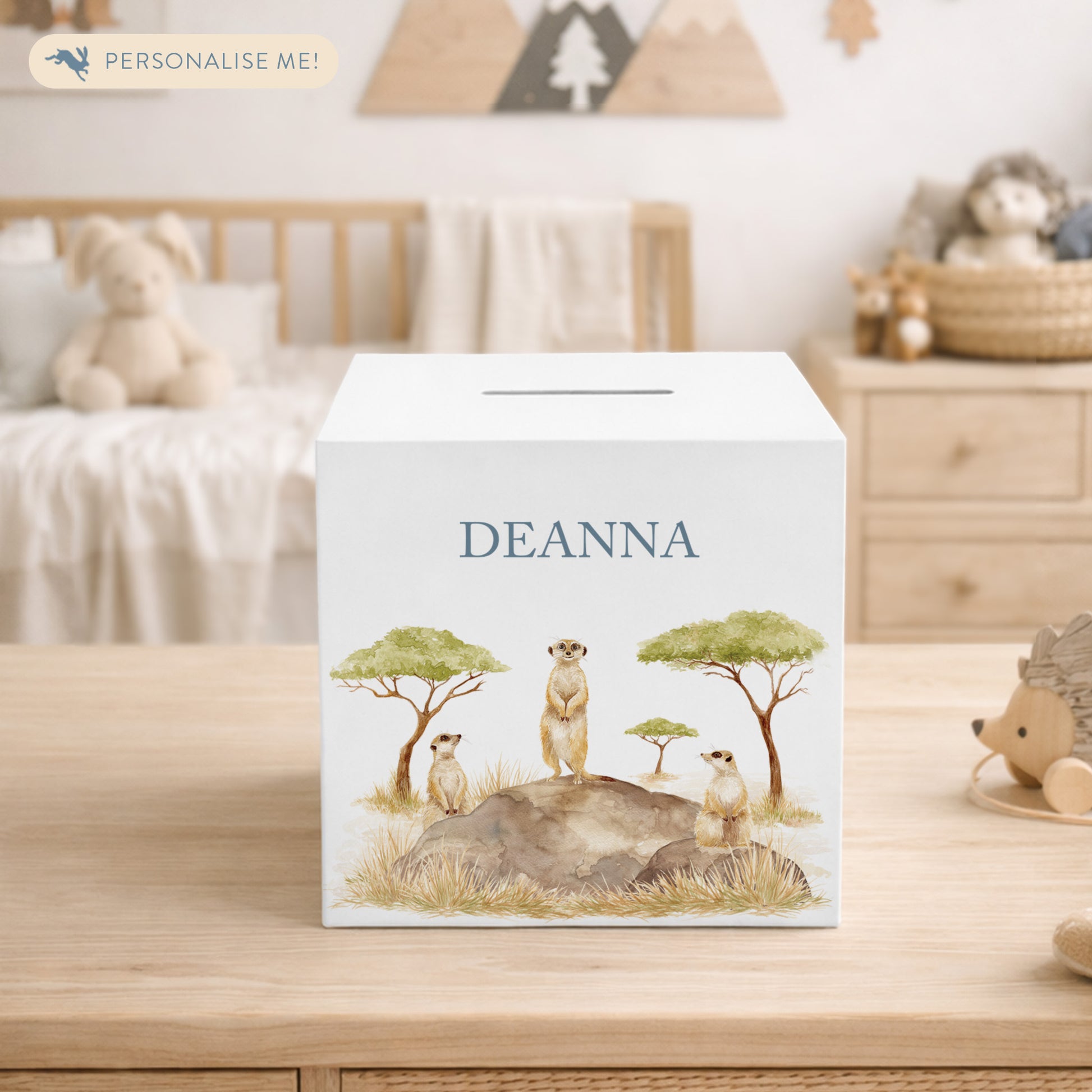 handmade wooden nursery money box with soft watercolour illustration, fun meerkat design 