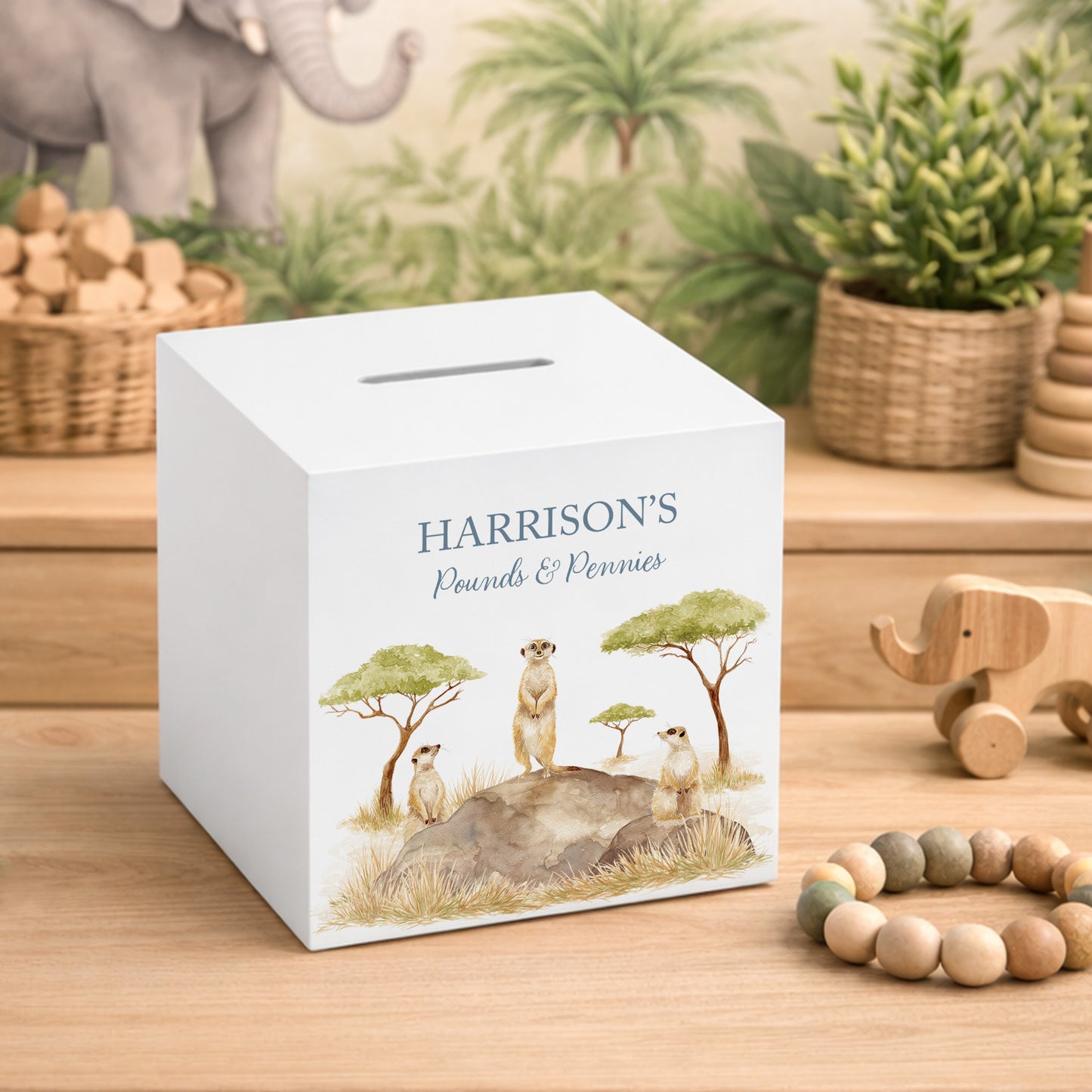 handmade wooden nursery money box with soft watercolour illustration, fun meerkat design 