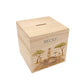 personalised handmade money box styled in nursery or childrens bedroom, This design features three happy meerkats sat on a rock. 