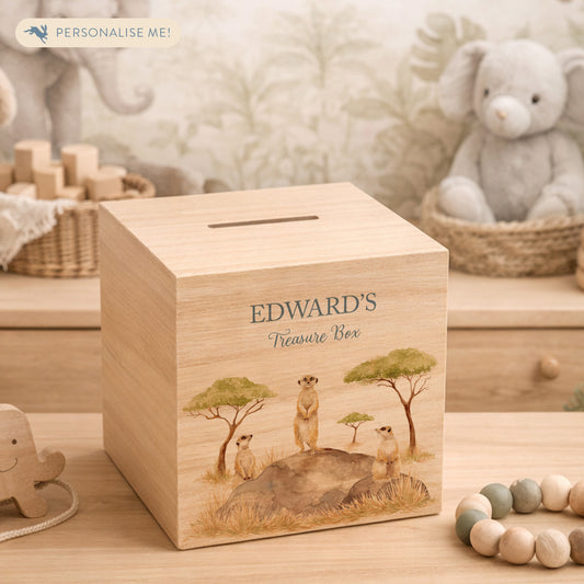 personalised handmade money box styled in nursery or childrens bedroom, This design features three happy meerkats sat on a rock. 