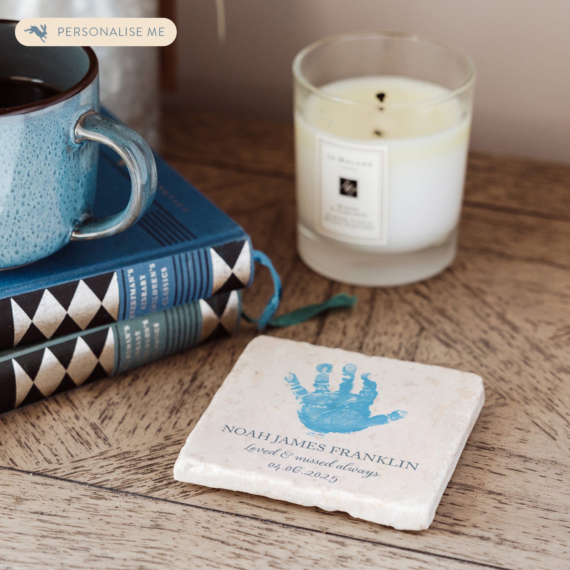 A square marble coaster featuring a watercolour personalised design of your baby, child's or loved ones hand or footprint. Coping with baby loss- perfect memorial for some who has died. 