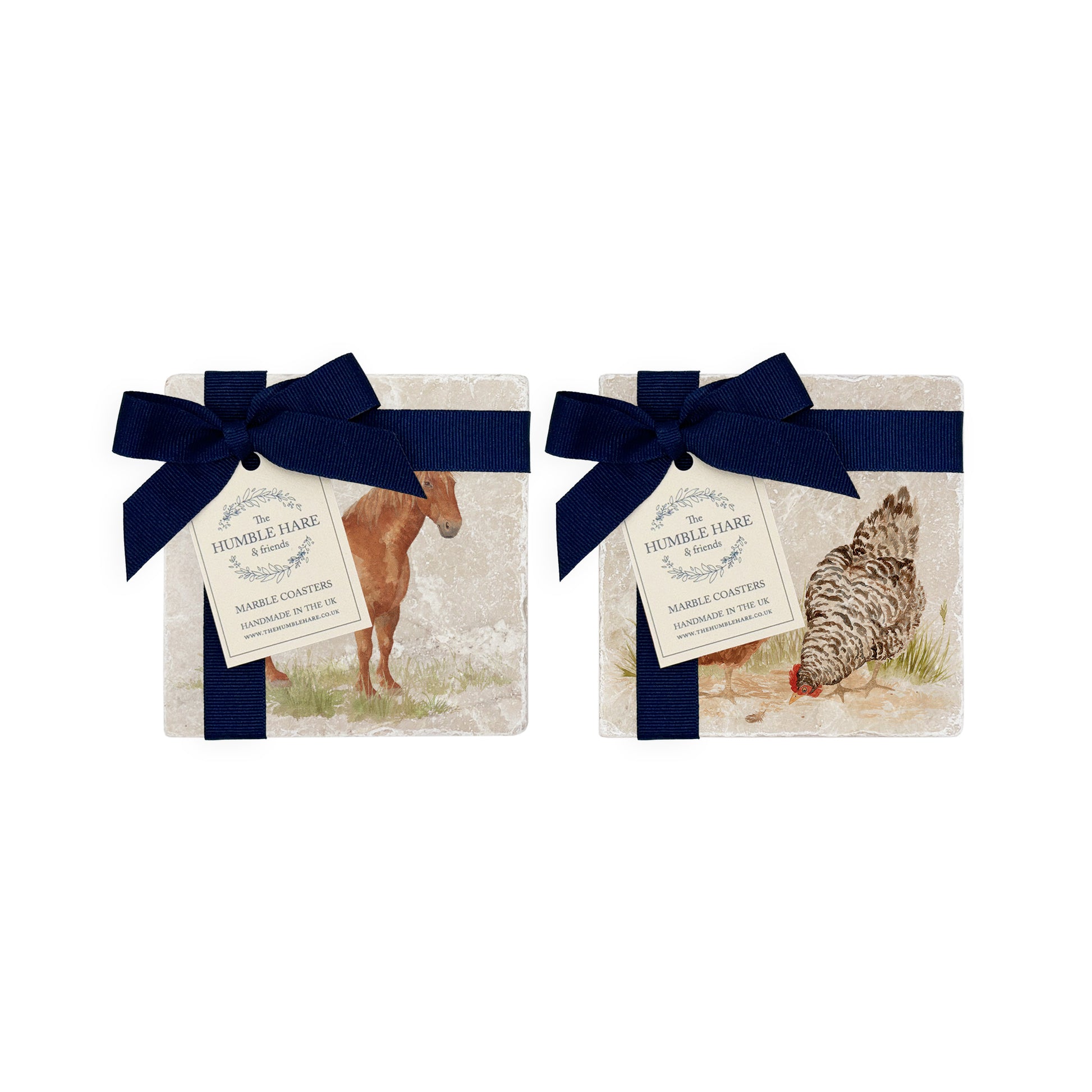 Set of four mix and match marble coasters with farm animal watercolour designs. The coasters have beautiful blue gift bows.