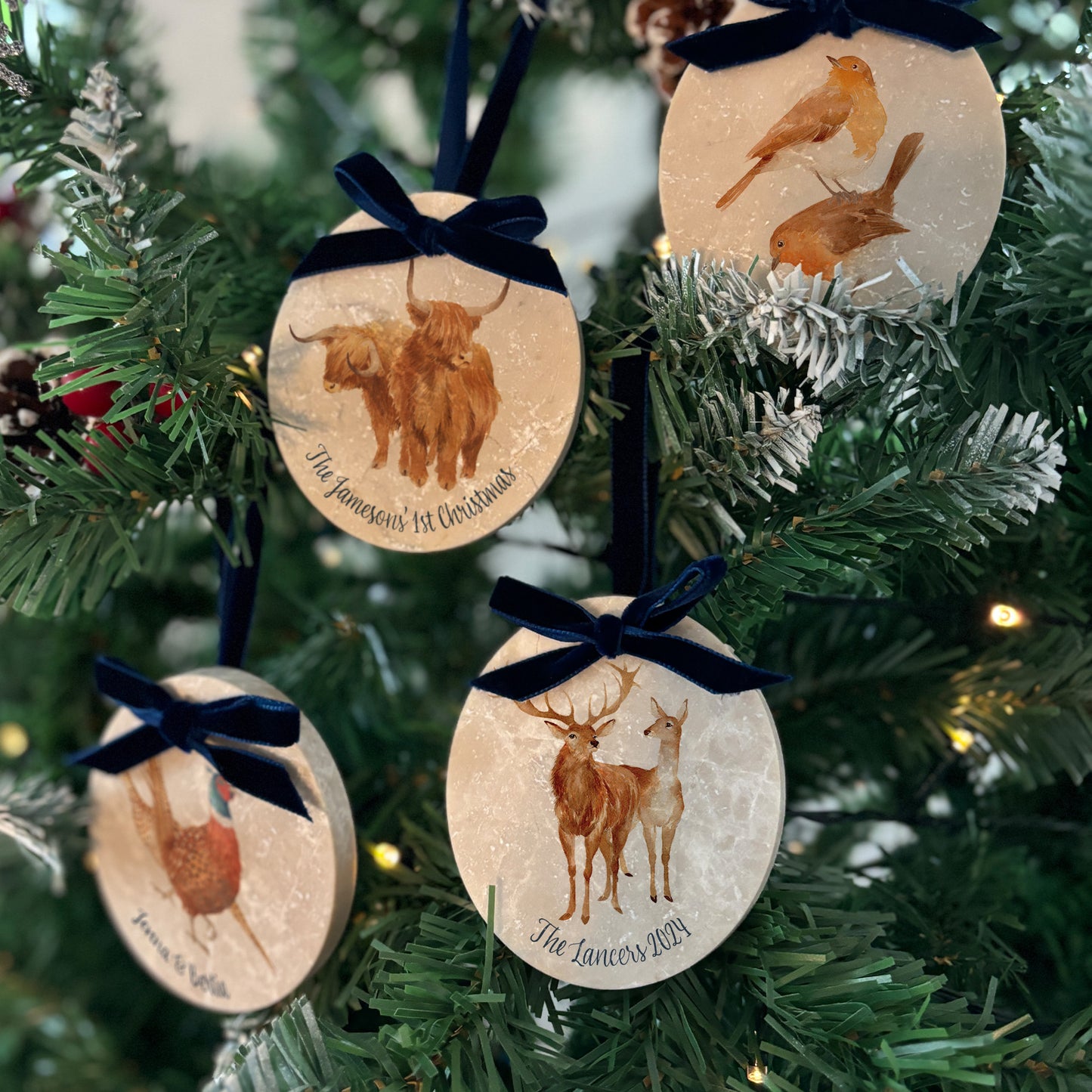 Create a timeless look for your Christmas tree with our oval-shaped marble bauble sets. Decorated with stunning watercolour artwork and finished with a velvet ribbon in your choice of colour, these baubles can be personalised to add a personal touch to your festive décor.