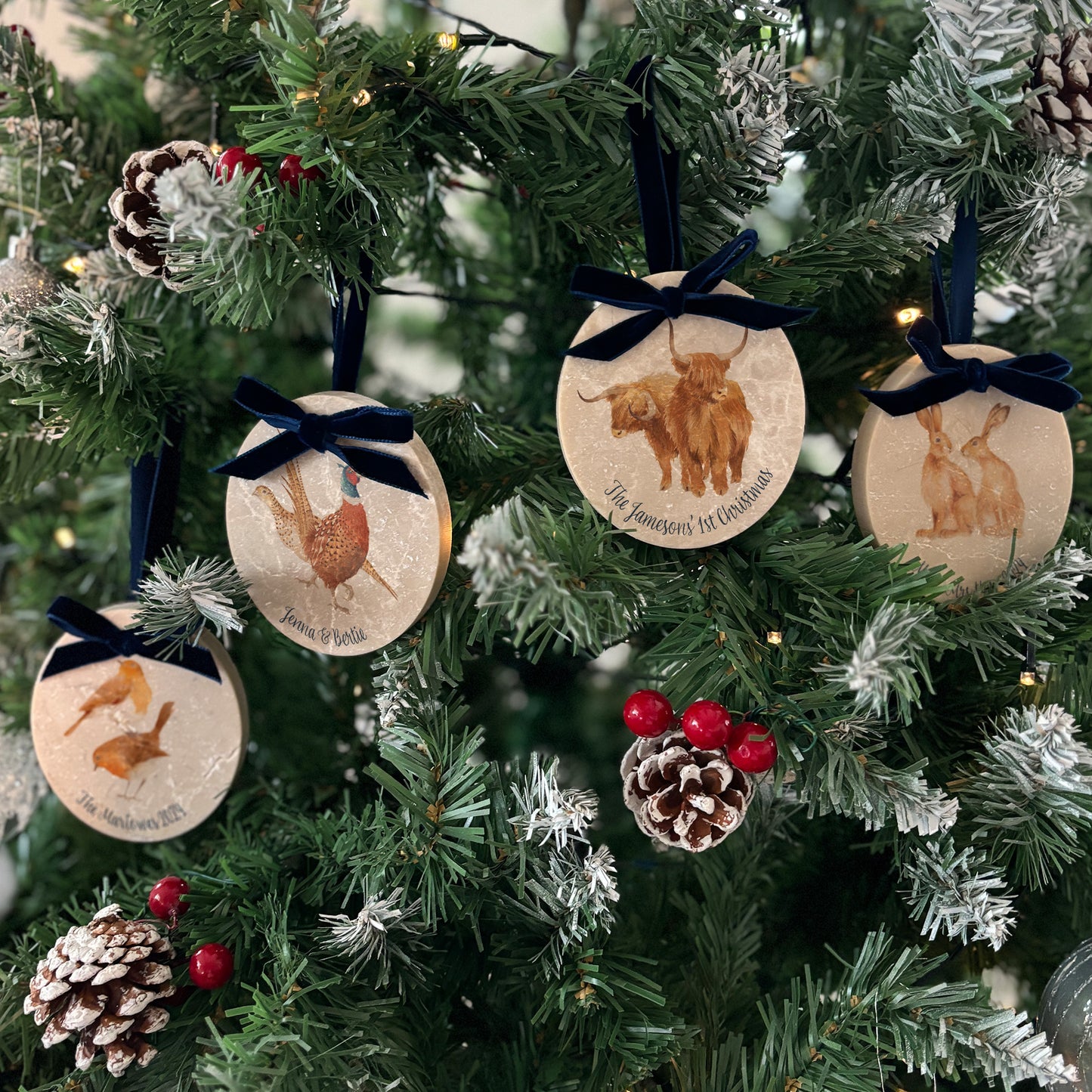 Add an elegant touch to your festive décor with our handcrafted oval-shaped marble bauble sets. Featuring beautiful watercolour designs of countryside animals and finished with a velvet ribbon in your choice of colour, these baubles can be personalised to reflect your unique style.