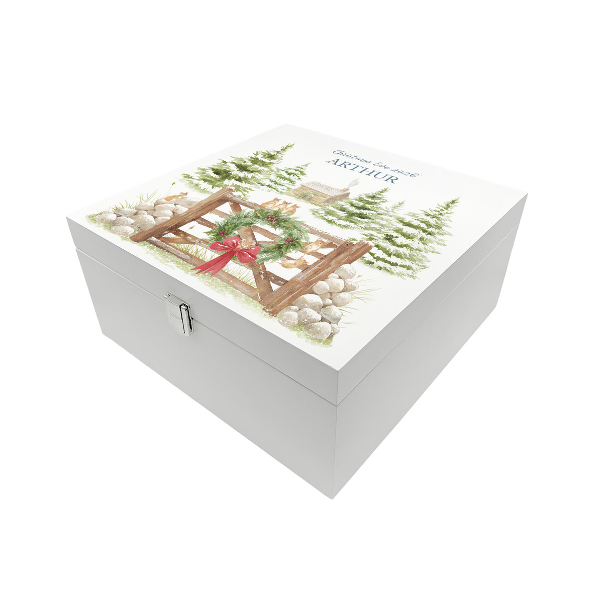 A white wooden Christmas Eve gift box with a winter scene of mice playing on a cottage gate in a snowy forest watercolour illustration, the box is personalised with a name and Merry Christmas phrase.